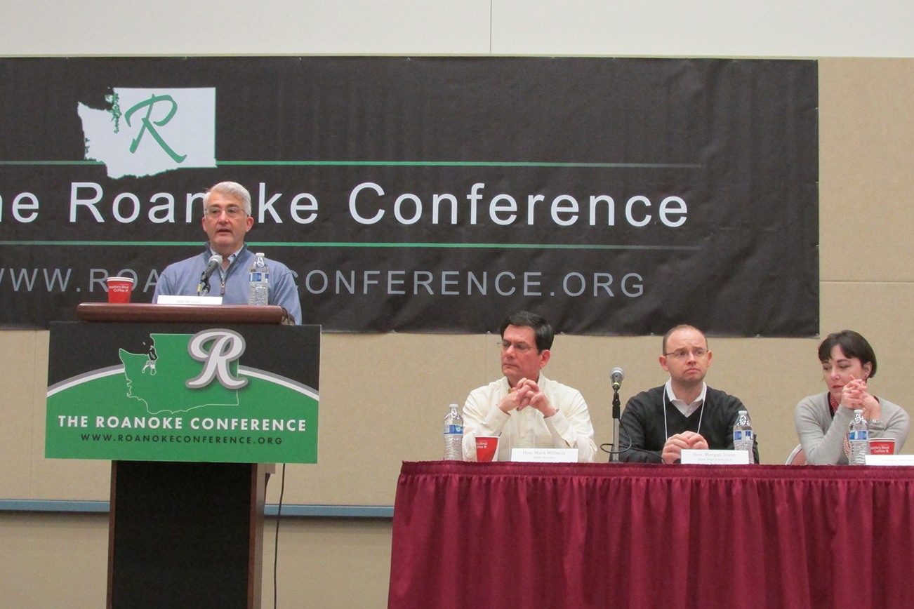 Scott D. Johnston photo: Bill Bryant, last year’s Republican nominee for Governor, moderates a panel on homelessness at the 8th annual Roanoke Conference, held over the weekend at the Ocean Shores Convention Center. Also on the panel are (left to right) State Senator Mark Miloscia, State Representative and Seattle police officer Morgan Irwin, Seattle journalist Erica C. Barnett and Michael Jackson, from Auburn Youth Resources.