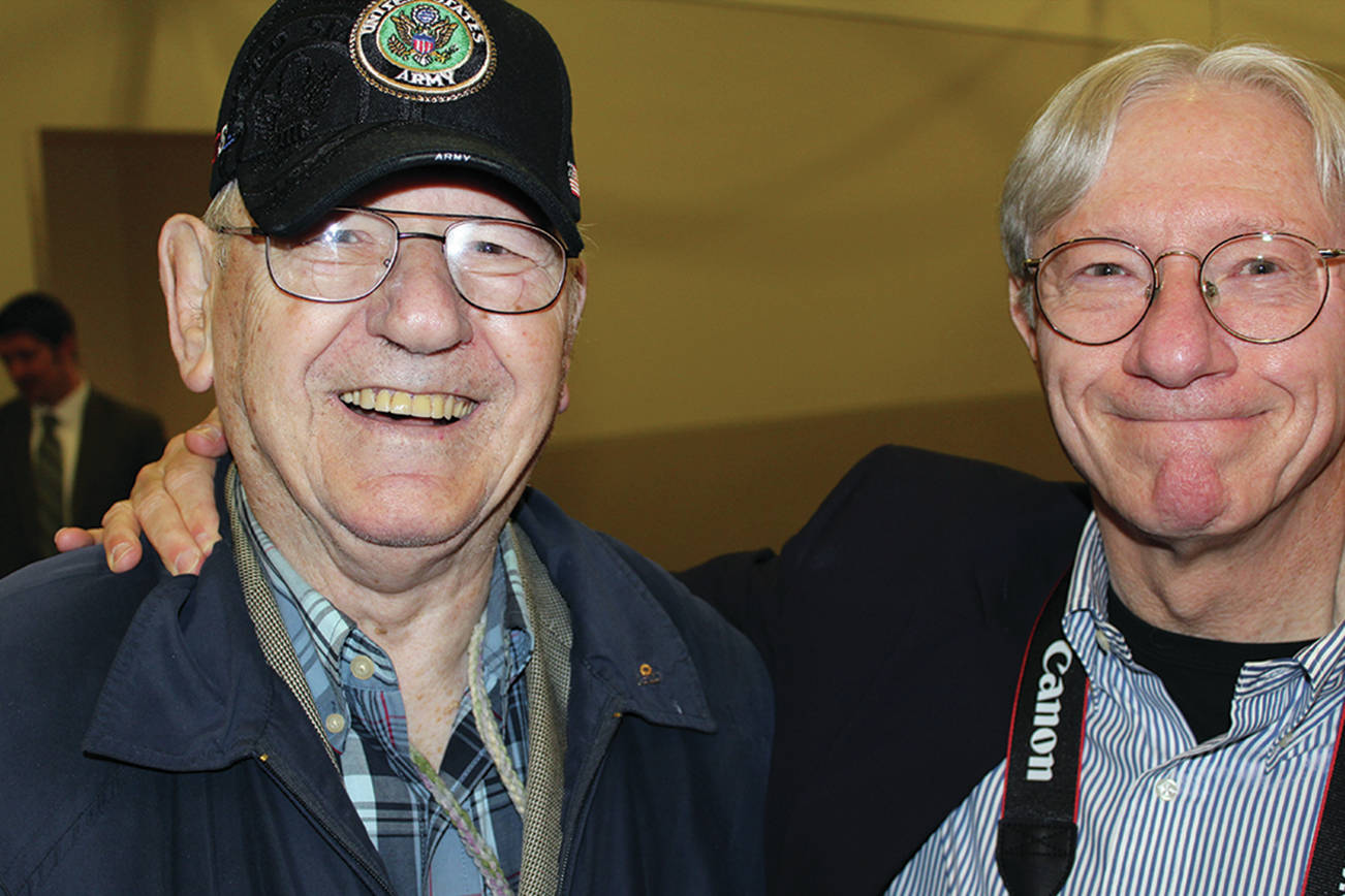 North Coast News photo: Arnold Samuels, left, and author John Hughes