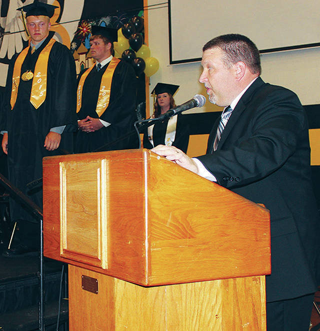 North Coast News file photo: North Beach High School Principal Brett Mackey addresses the 2015 graduating class.