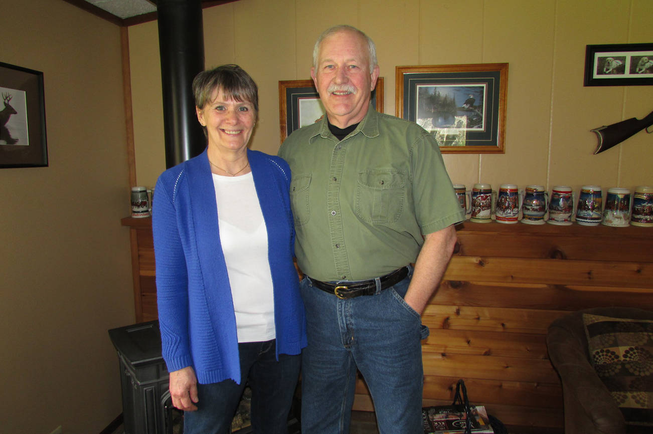 Photo by Scott D. Johnston: Mike and Chris Styner in their home near the Humptulips River.